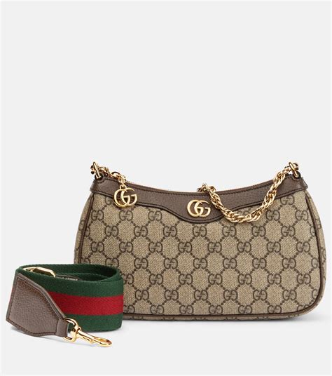 gucci gg supreme shoulder bag|Gucci ophidia clear bag.